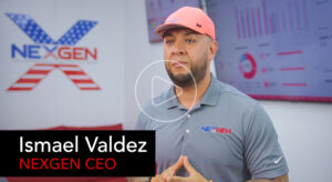 A man wearing a pink cap and gray NexGen shirt stands indoors; charts and the NexGen logo—known for SEO expertise—are visible in the background. Text reads: "Ismael Valdez, NEXGEN CEO.